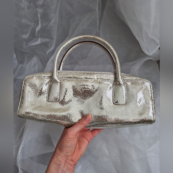kate spade Handbags - Kate Spade Silver Metallic Top Handle Bag